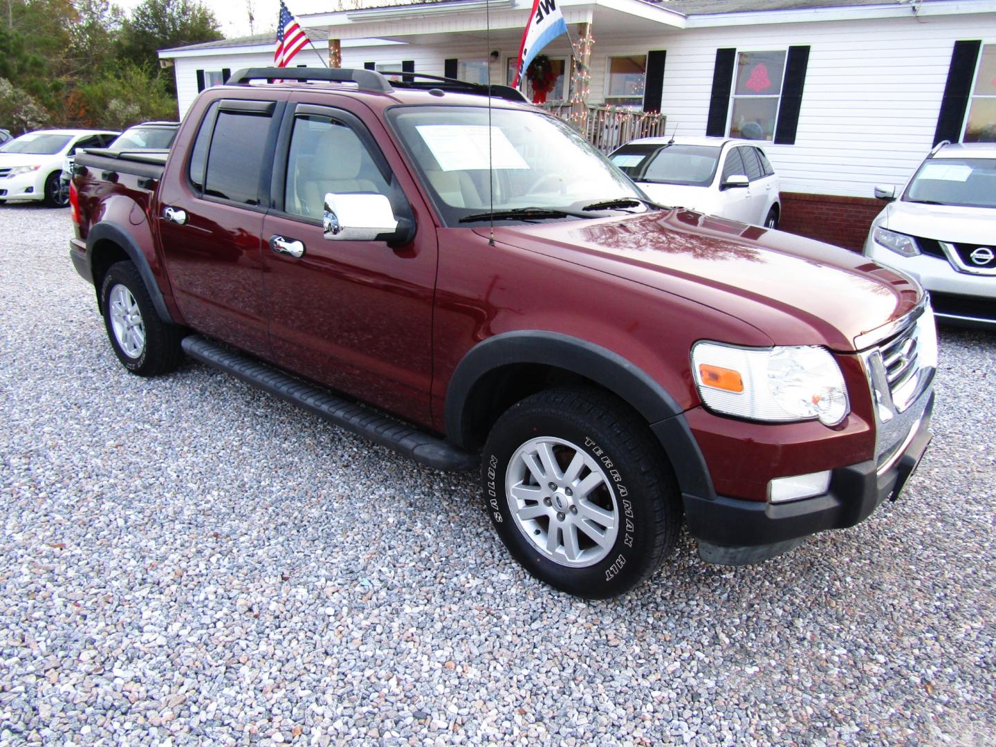 2010 Bronze /Tan Ford Explorer Sport Trac XLT 4.0L 2WD (1FMEU3BE3AU) with an 4.0L V6 SOHC 12V engine, Automatic transmission, located at 15016 S Hwy 231, Midland City, AL, 36350, (334) 983-3001, 31.306210, -85.495277 - Photo#0